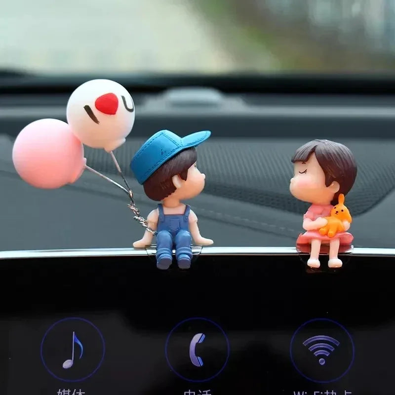 A set of cute couple balloon car ornaments featuring a girl and a boy with balloons.