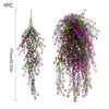 A long, cascading arrangement of artificial purple and green morning glory flowers hanging vertically.
