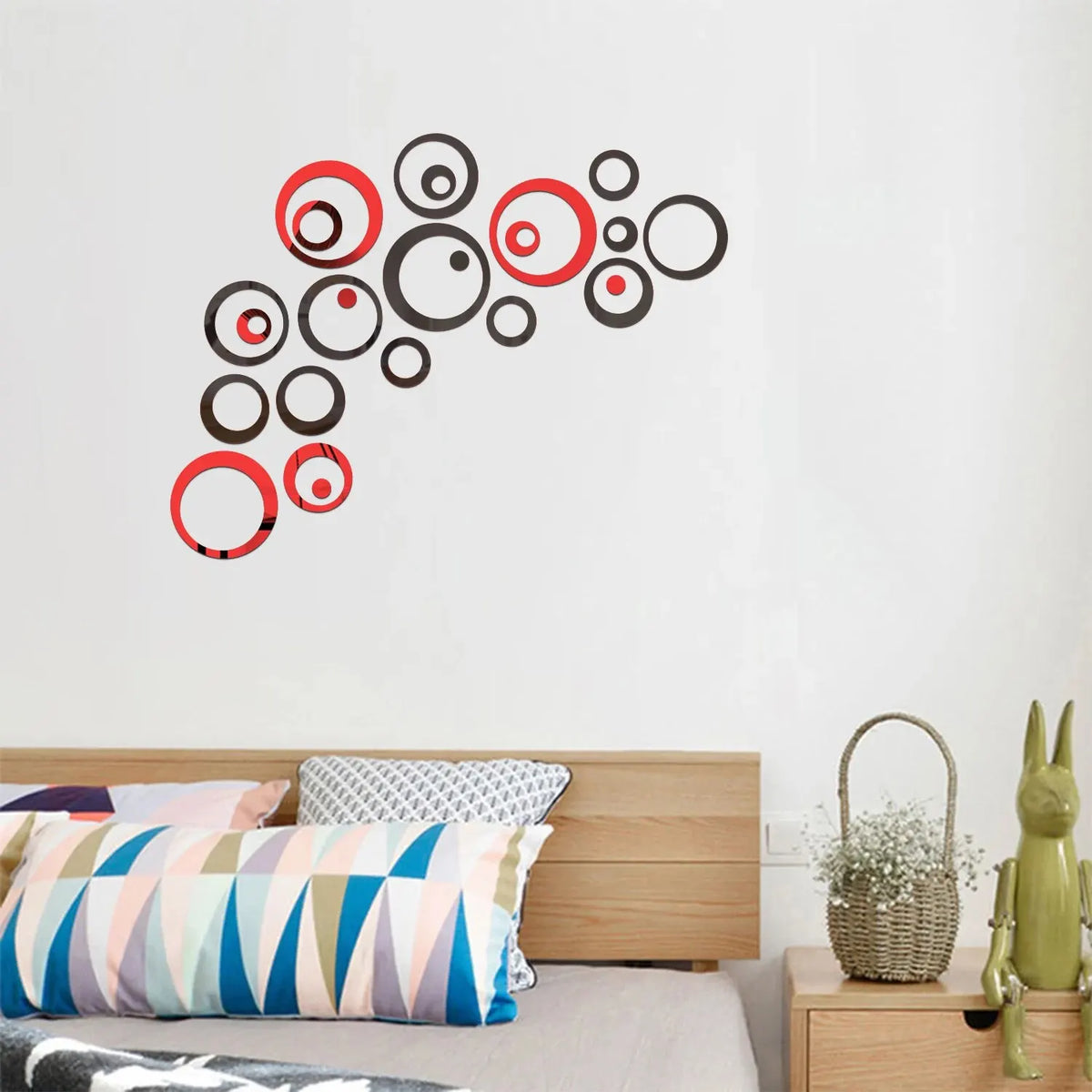 A collection of geometric hollow circle mirror wall stickers in red, black, and white on a white background.