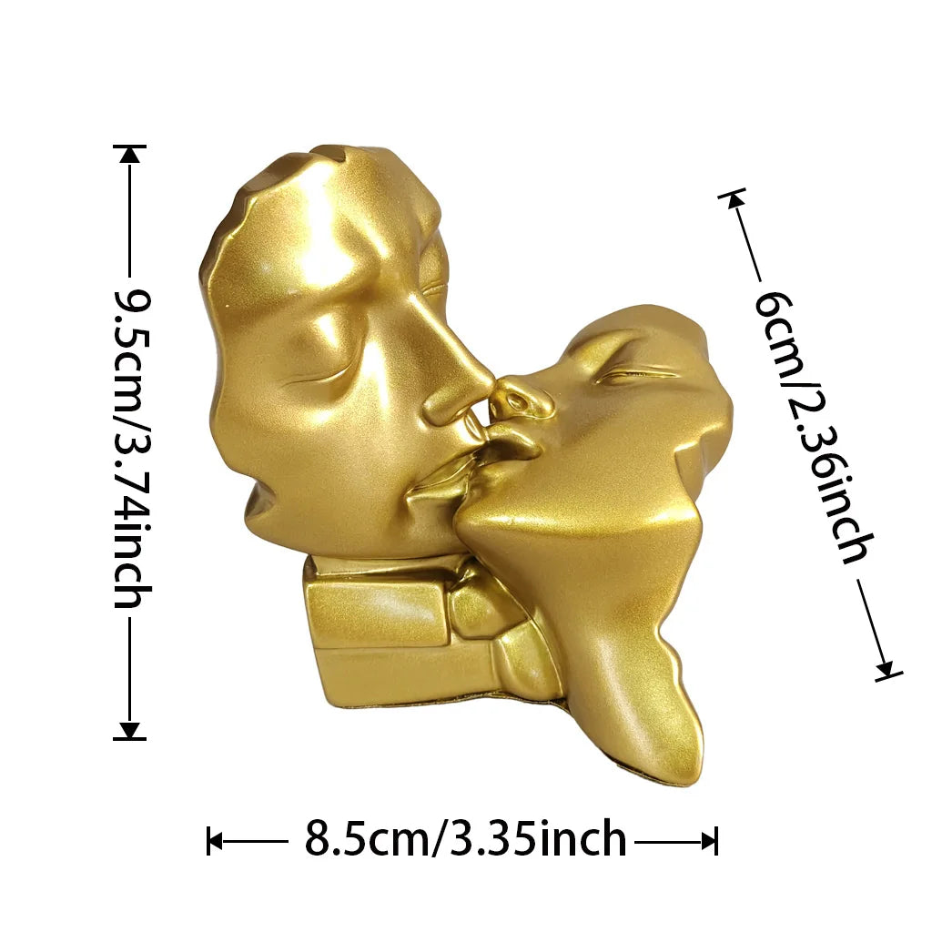 Gold resin sculpture of a kissing couple with detailed facial features