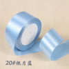 Roll of light blue silk satin ribbon for gift wrapping and craft projects