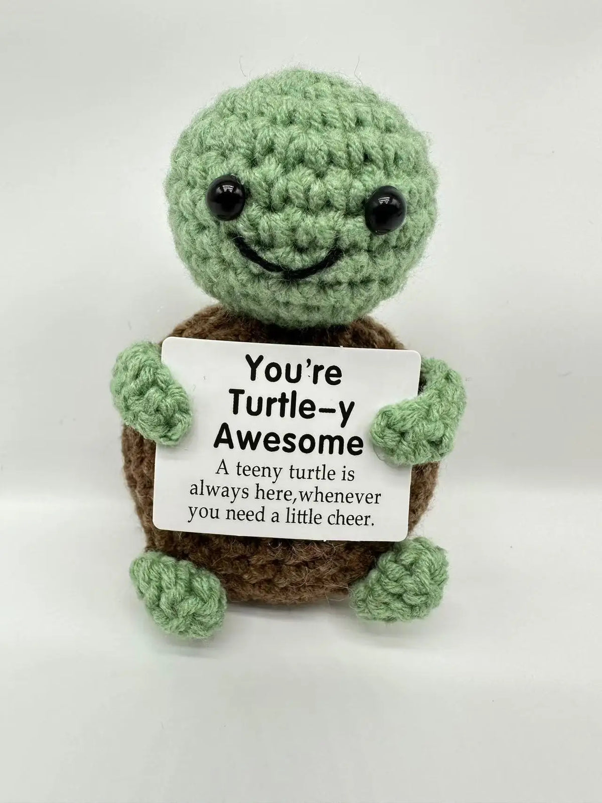 Handmade crochet turtle baseball bat doll with a positivity card