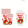 A set of 10 pink disposable cups with a sweet strawberry theme for a birthday party.