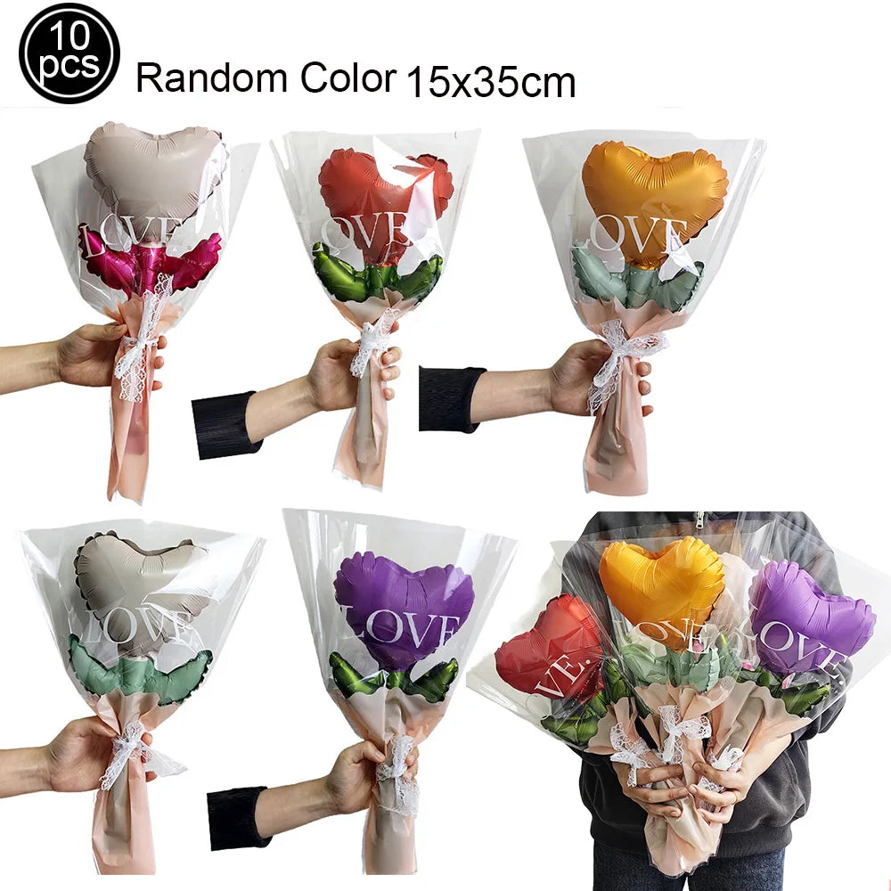 Ten random color heart letter balloons with foil finish displayed in various arrangements.