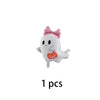A white ghost shaped foil balloon with a pink bow decoration for Halloween party use