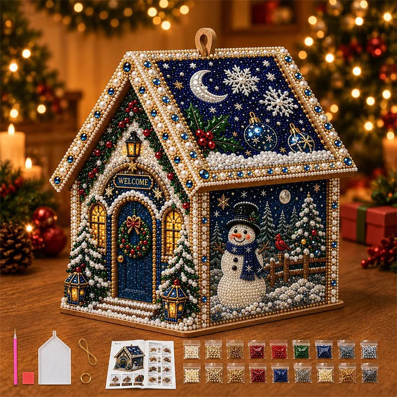 A detailed diamond painting kit of a Christmas cabin house featuring a snowy scene and festive decorations.