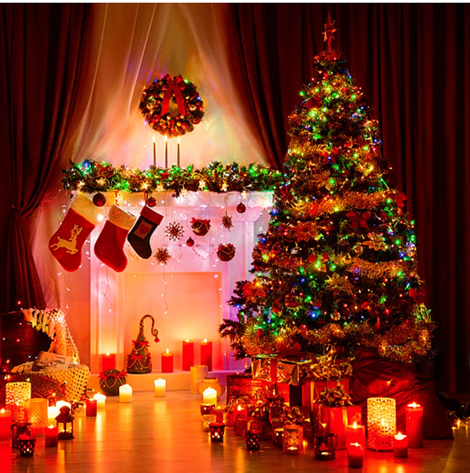 A festive Christmas scene featuring a decorated tree and fireplace illuminated by warm lights.