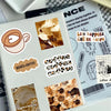 Primer plano de una página de cuaderno con varios stickers temáticos de café y libros.