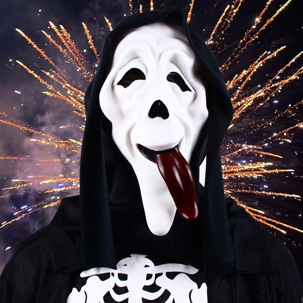 A white and black horror mask resembling a screaming skeleton with a long tongue, shown against a dark, sparkling background.