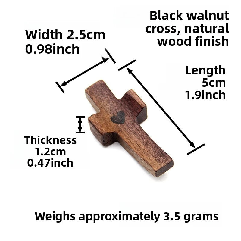 A dark brown wooden cross with a natural wood finish, measuring 2.5cm wide and 5cm long.