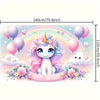 A magical pink unicorn with a rainbow background surrounded by balloons and flowers for a birthday party backdrop.