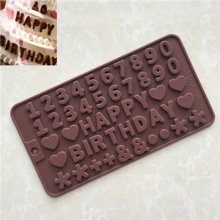 A silicone mold set for baking featuring alphabet and number shapes in a brown color.