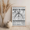 A framed piece of black and white calligraphy art featuring a drawing of a Titan's head and the title Attack on Titan