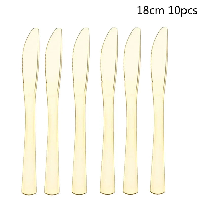 A set of 10 disposable gold-colored party knives with 18cm blades.