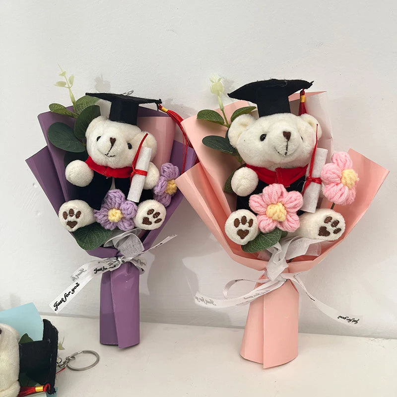 A handcrafted crochet flower bouquet featuring a teddy bear wearing a graduation cap and gown.