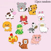 A collection of twelve random cute animal fridge magnets featuring cats, tigers, rabbits, pandas, and other soft pastel-color
