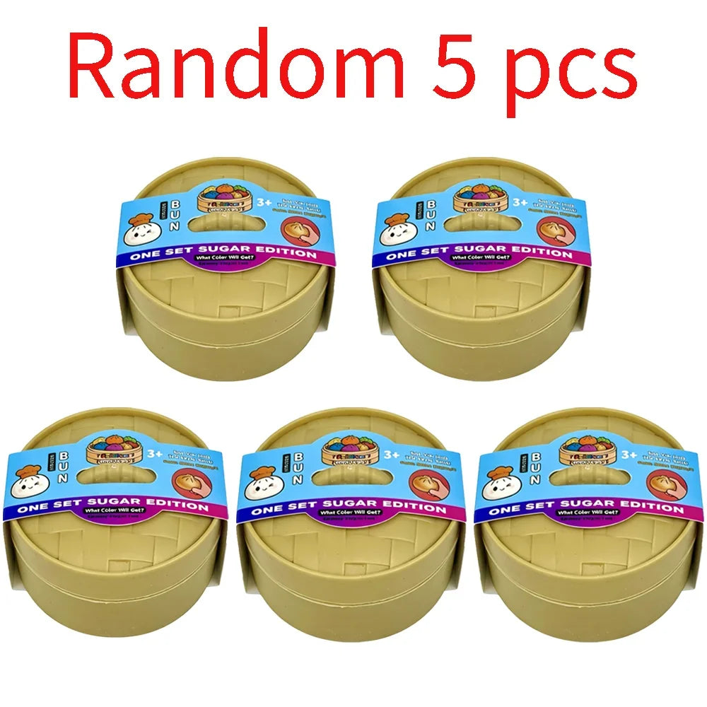 Five yellow squishy dumpling stress relief toys in individual packaging boxes