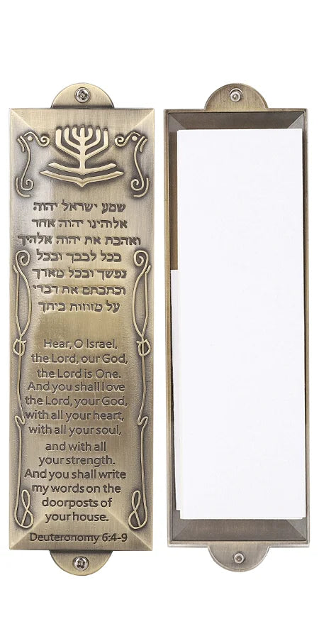 A decorative mezuzah case with a scripture scroll and peel-and-stick mounting for the words Deuteronomy 6:4-9.