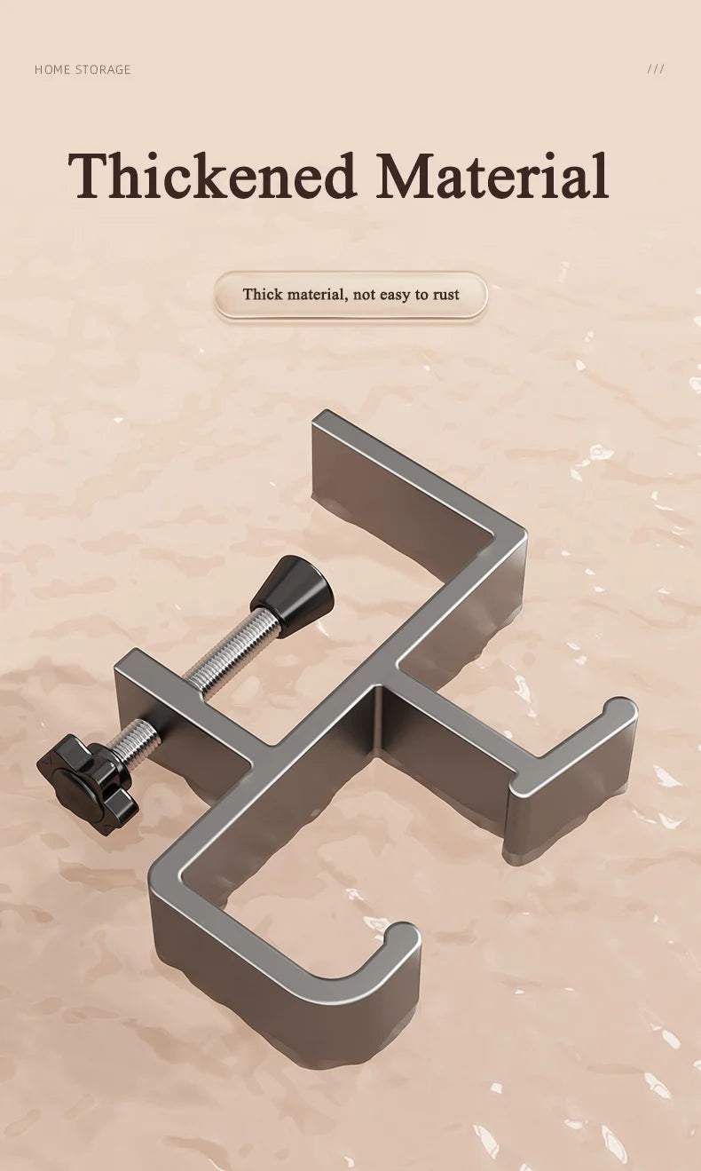 A close-up view of a thick metal adjustable desk bag hook designed for securing backpacks and bags.