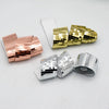 A collection of 3D mirror mosaic wall tiles in gold and silver finishes.