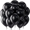 A bunch of glossy black latex balloons tied together for celebrations.
