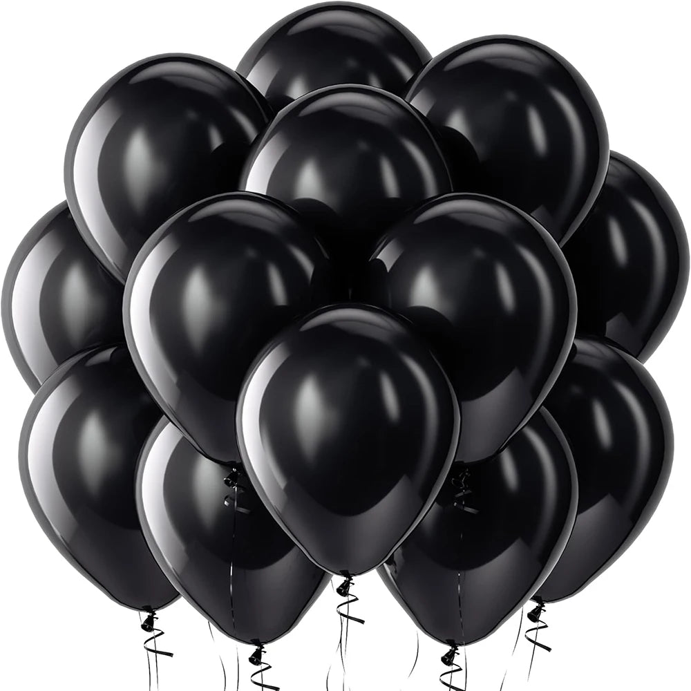 A bunch of glossy black latex balloons tied together for celebrations.