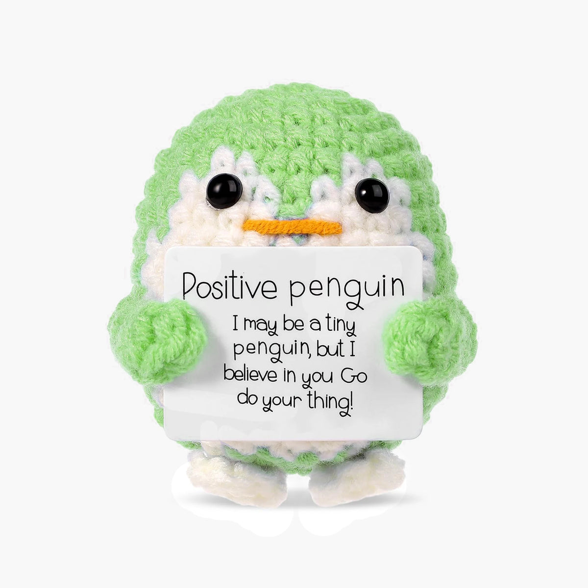 Handcrafted crochet penguin plush in green with an encouraging card inside