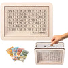 A wooden money saving box with a grid tracker and several stacks of currency.