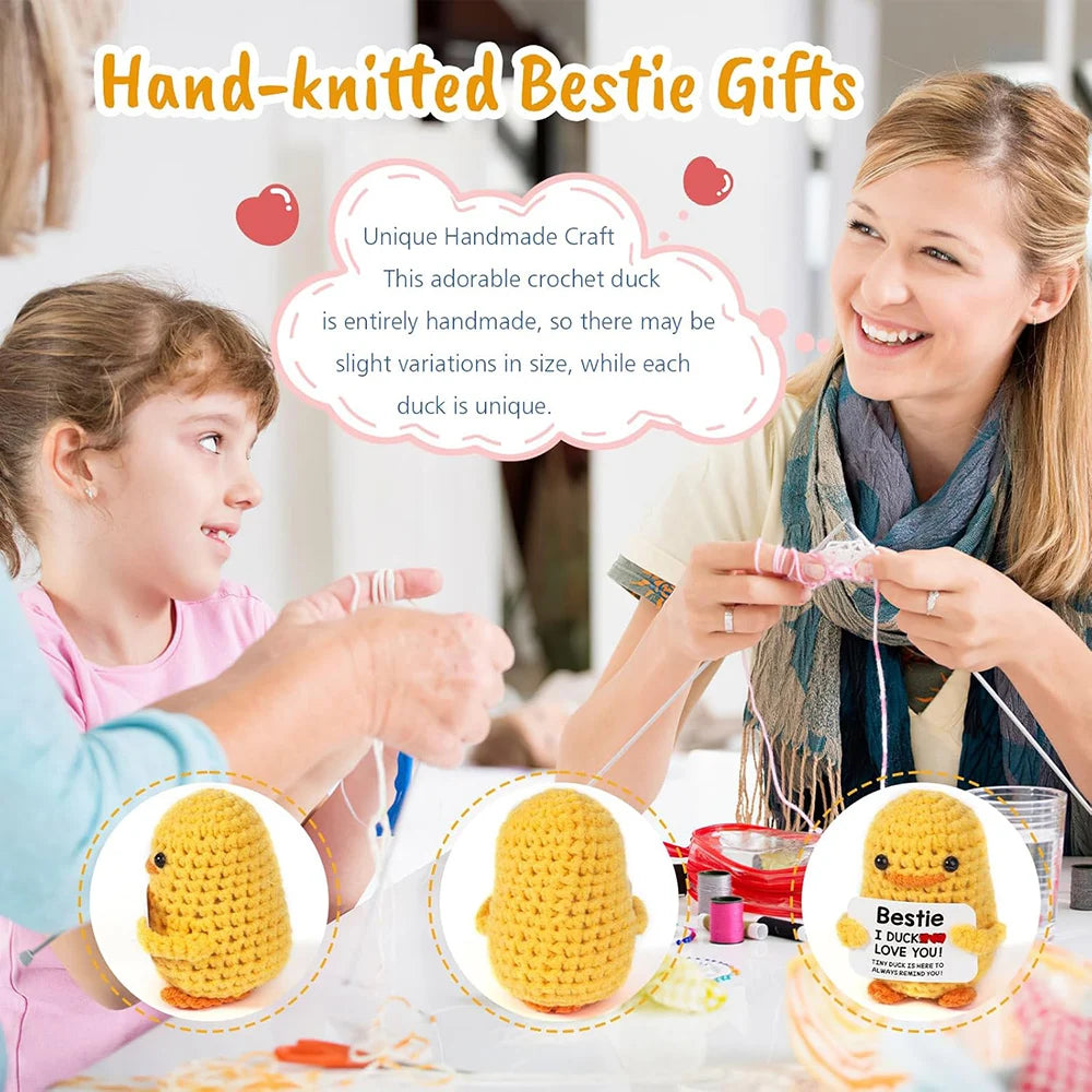 A woman is hand-knitting a yellow duck plush toy for a child, showing the finished product.