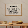 A framed piece of wall art featuring five black stars above the text Chef was cute would eat here again
