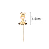 A cute cartoon giraffe cake topper with a stick, shown next to a measurement of 4.5cm.