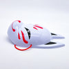 A white fox face mask with red accents and black markings, displayed against a white background.