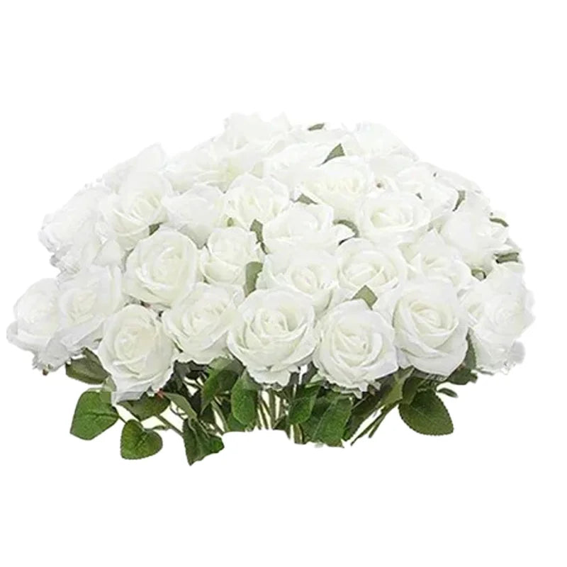 A bouquet of white velvet artificial roses with bendable stems for weddings and home decor.