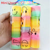 A clear plastic package containing 12 colorful, striped spring toys or party favors for children.