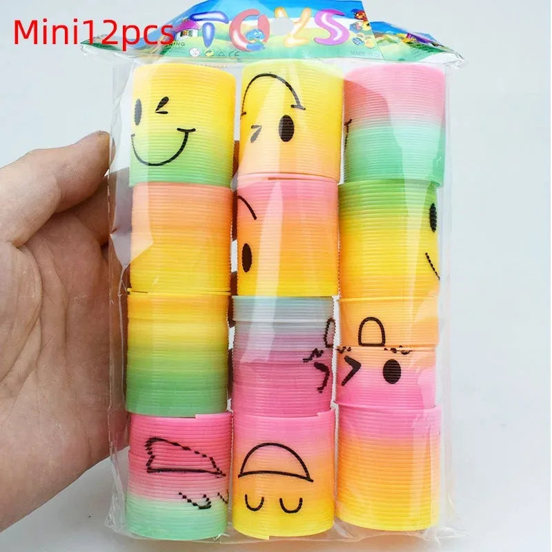 A clear plastic package containing 12 colorful, striped spring toys or party favors for children.