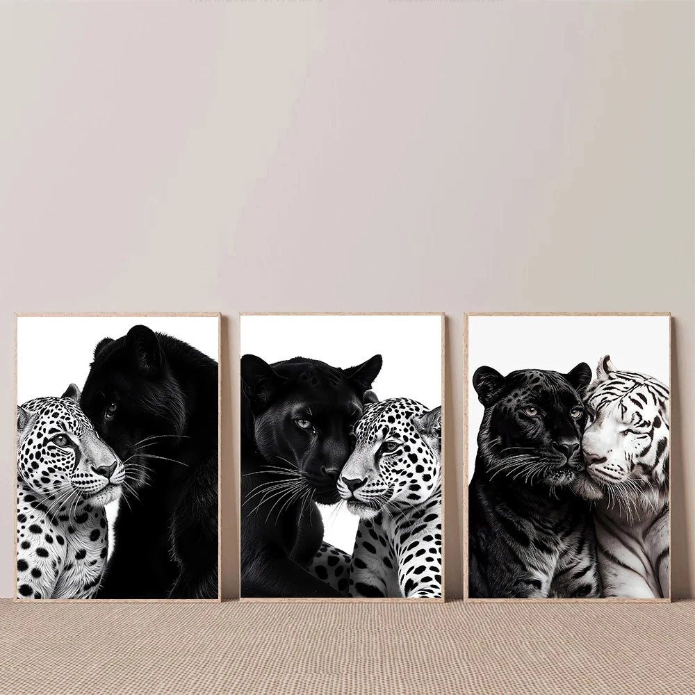 A set of three canvas art prints featuring close-up portraits of various big cats including a leopard, a black panther, and a