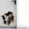 A gray mouse peeking out of a jagged hole in a white wall, used as a self-adhesive decal.