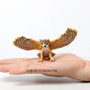 Realistic birds of prey figurine set featuring an owl, vulture, and bald eagle resting on a human hand.