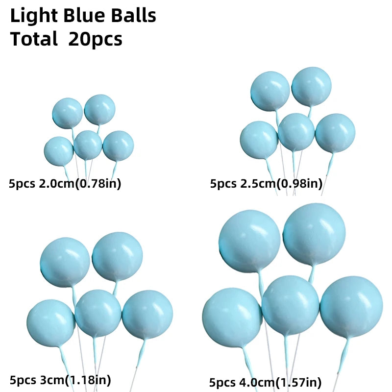 A collection of light blue balloons in various sizes and colors for cake toppers.