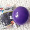 A purple latex balloon is shown next to a package of Feng Che wind balloons on a white surface.