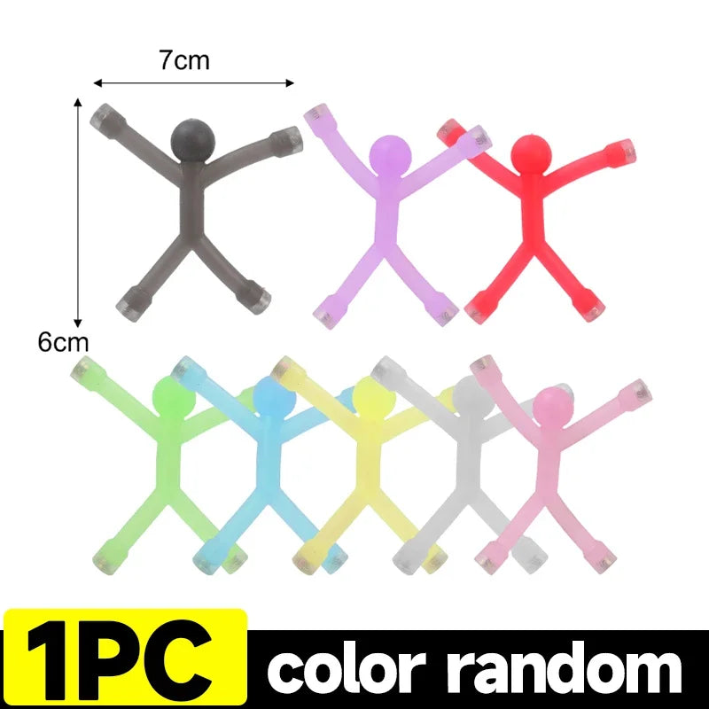 A set of 12 colorful flexible mini figures used as refrigerator magnets.
