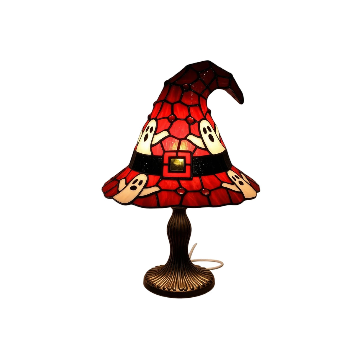 A witch hat night light featuring a stained glass effect design with red and black elements.