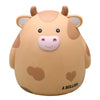 A cute, light brown cow piggy bank with pink features and the text A BULLISH on the bottom.