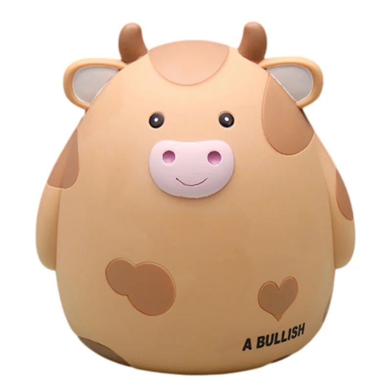 A cute, light brown cow piggy bank with pink features and the text A BULLISH on the bottom.