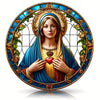 A painting of the Virgin Mary with a halo, wearing blue and gold robes, holding a red heart, set in an ornate circular frame.