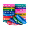 A set of twenty colorful silicone bracelets featuring inspirational Bible verses and phrases.