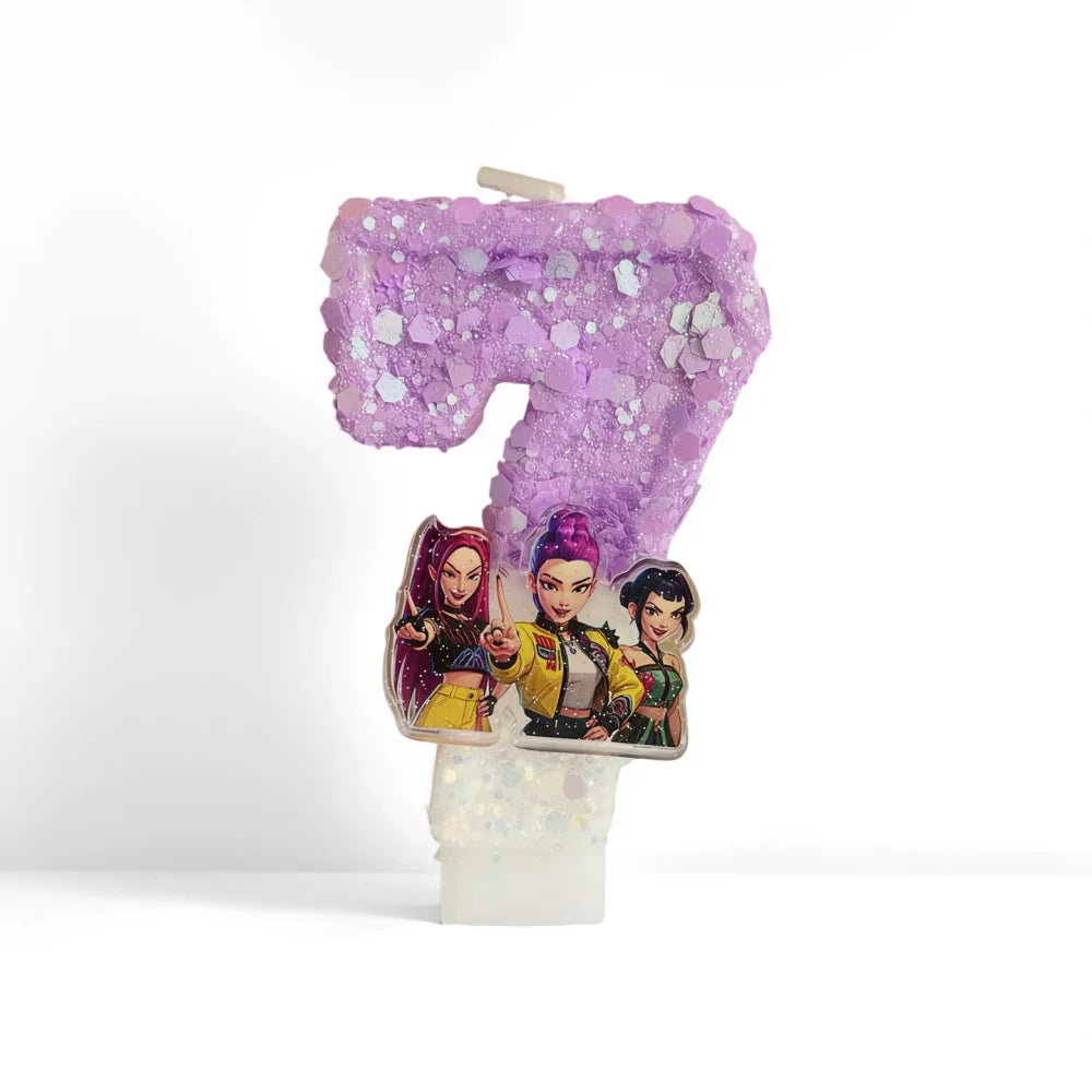 A purple glitter candle shaped like the number 7 featuring illustrations of three female characters.