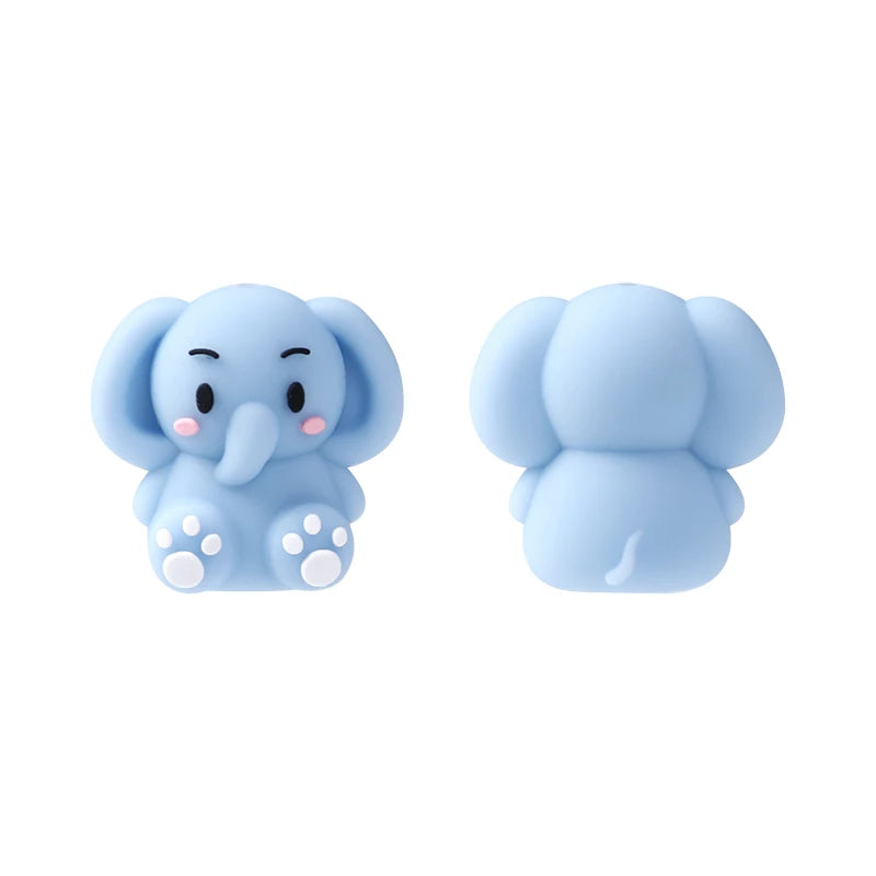 A pair of light blue silicone elephant beads used for jewelry making and DIY crafts.