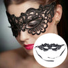 A close-up of a woman wearing a black lace floral eye mask for a masquerade or cosplay.