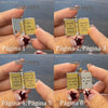Six images showing an openable book pendant necklace with engraved messages on different pages